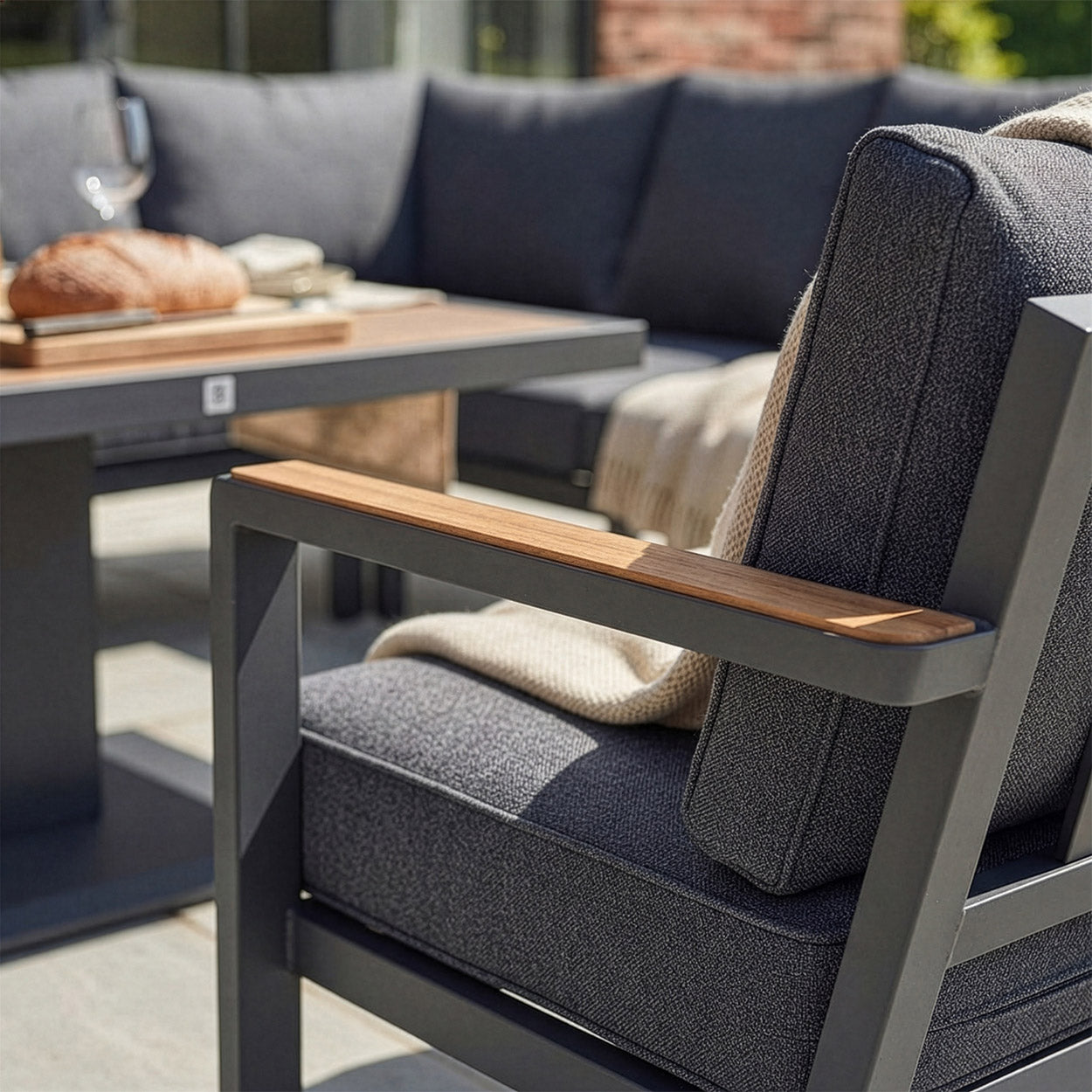 Wood Effect Details On The Black Powdercoated Dining Lounge Set
